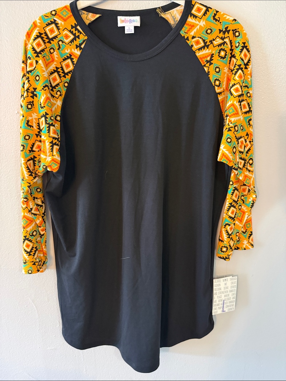 LuLaRoe Black Raglan Tee with Yellow Aztec-Print Sleeves